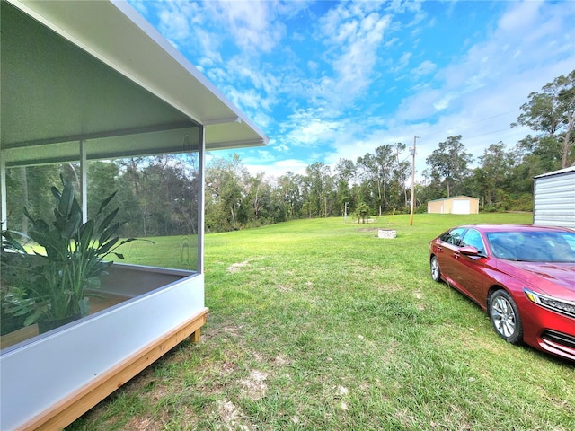 view of yard featuring a storage shed