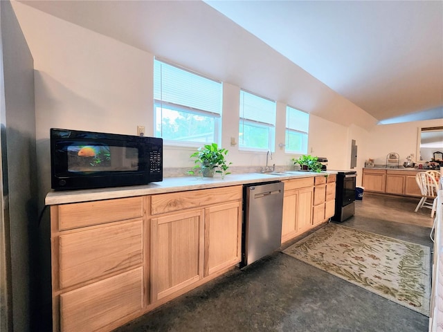 kitchen featuring stainless steel dishwasher, light brown cabinets, lofted ceiling, and sink