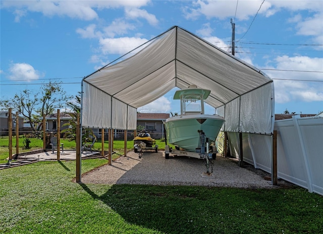 view of car parking with a lawn