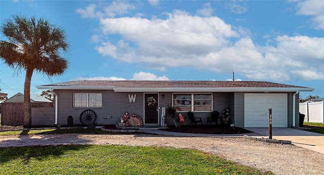 ranch-style home with a garage