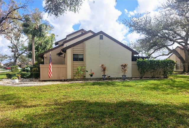 view of home's exterior featuring a yard