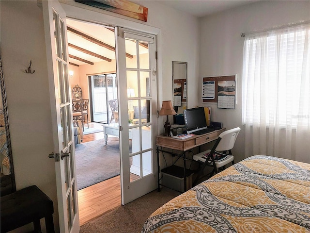 bedroom featuring carpet floors and french doors