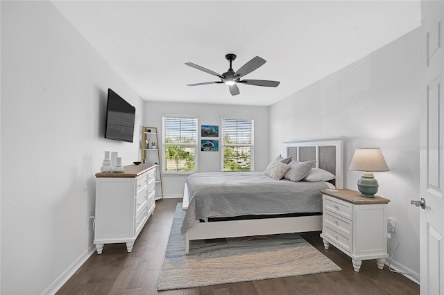 4008 Via Sienna Cir, Sarasota, FL 34243 - bedroom featuring baseboards, dark wood-type flooring, and ceiling fan