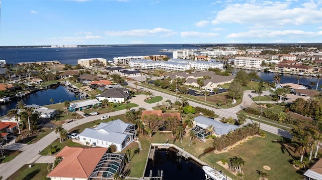 drone / aerial view with a water view