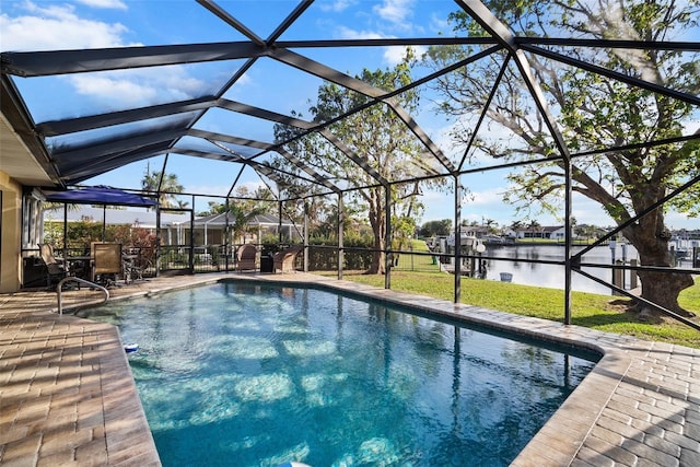 view of swimming pool with a patio area, a lanai, a water view, and a yard