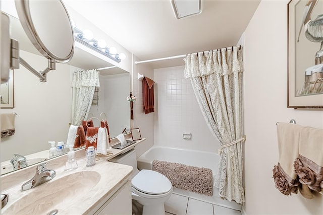 full bathroom featuring toilet, shower / bath combination with curtain, vanity, and tile patterned floors