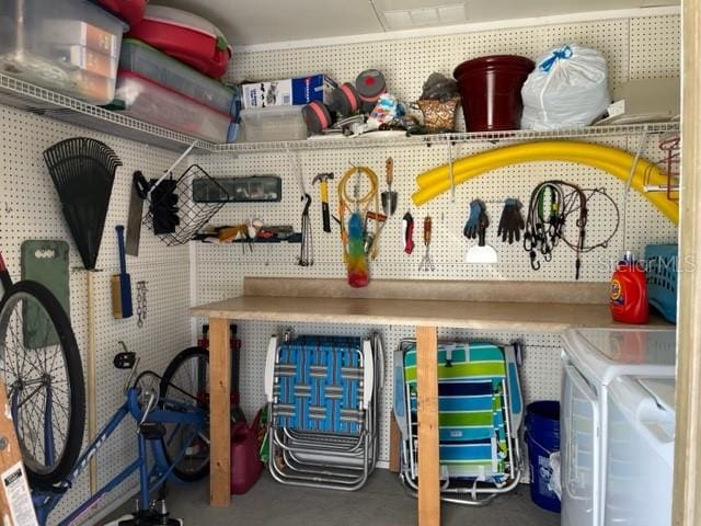 storage room with washing machine and dryer