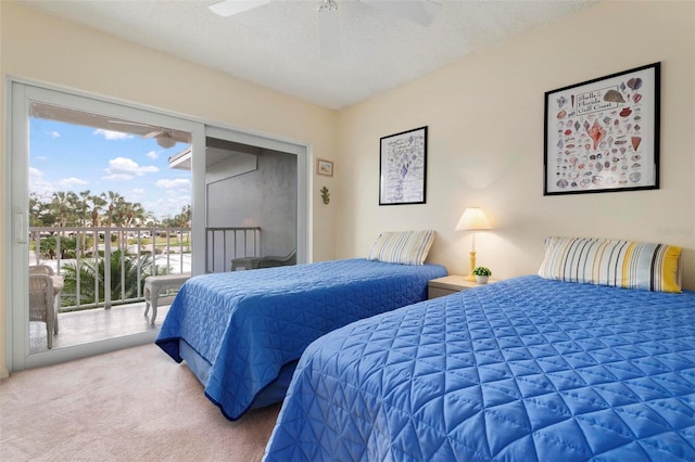 carpeted bedroom featuring ceiling fan, a textured ceiling, access to outside, and multiple windows