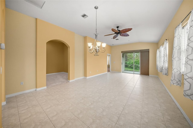 empty room with ceiling fan with notable chandelier, light tile patterned flooring, and lofted ceiling