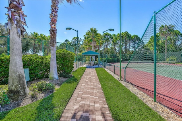 surrounding community featuring a gazebo and tennis court