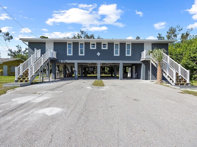 view of front of house featuring a carport