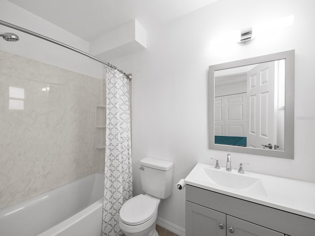 full bathroom featuring vanity, toilet, and shower / bathtub combination with curtain