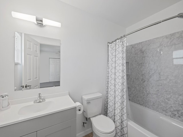 full bathroom featuring vanity, toilet, and shower / bathtub combination with curtain