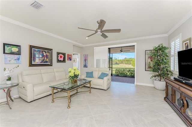 living room featuring plenty of natural light, light tile patterned flooring, and ornamental molding