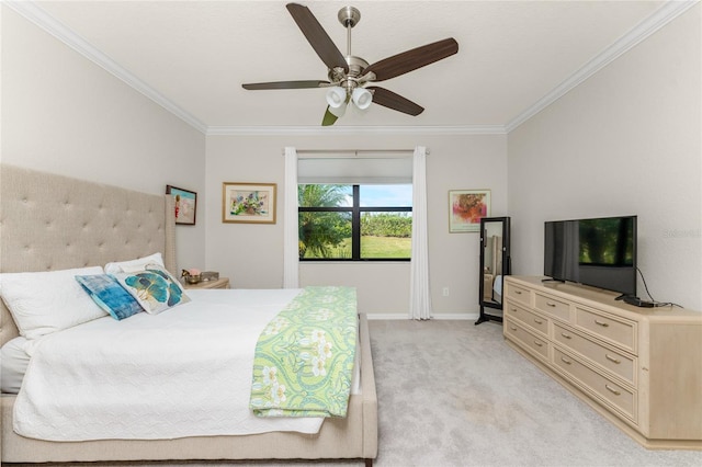 bedroom with ceiling fan, light colored carpet, and crown molding