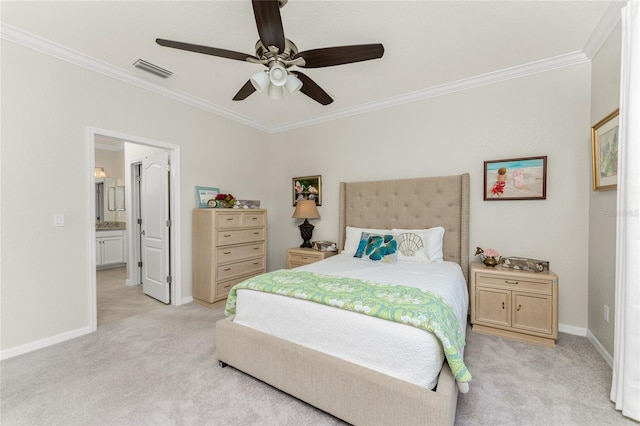 bedroom with ceiling fan, crown molding, ensuite bathroom, and light colored carpet