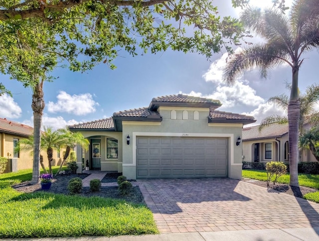 mediterranean / spanish-style house featuring a garage