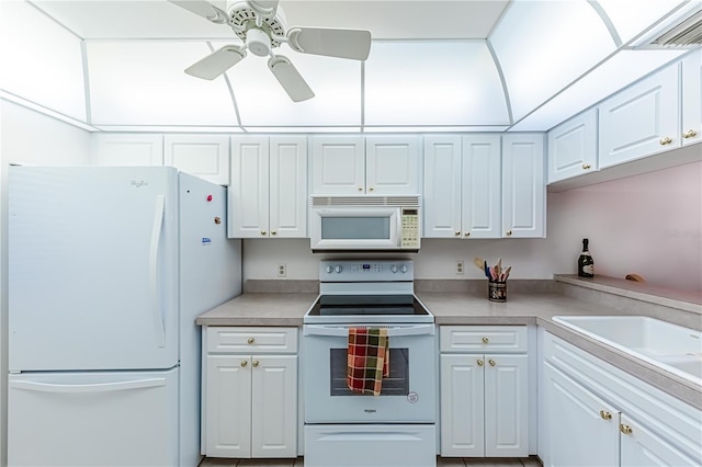 kitchen with ceiling fan, white cabinets, and white appliances