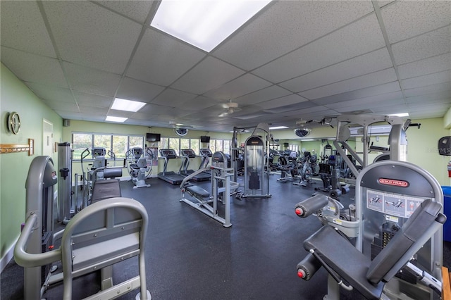 gym featuring a paneled ceiling