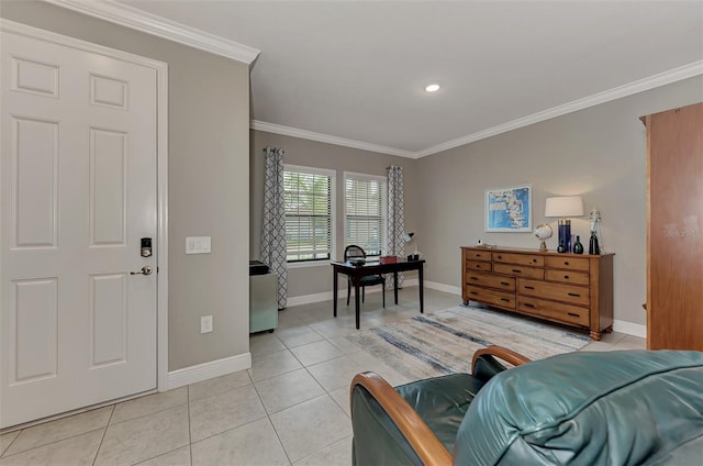 tiled entryway featuring crown molding