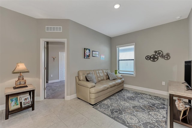 living room featuring light tile patterned floors