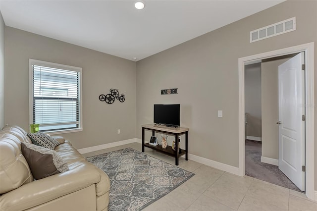 living room featuring light tile patterned floors