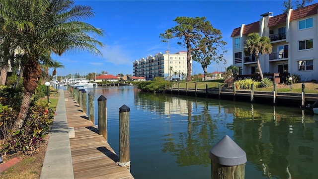 dock area featuring a water view