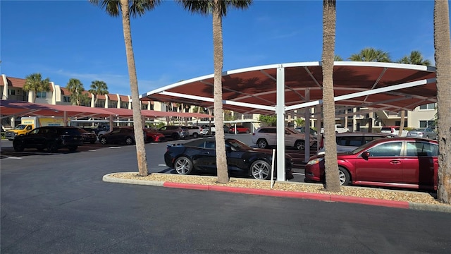 view of parking / parking lot with a carport