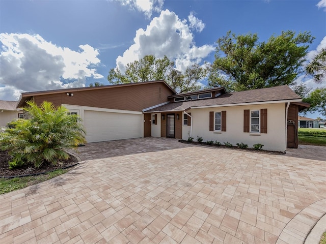 view of front of house with a garage