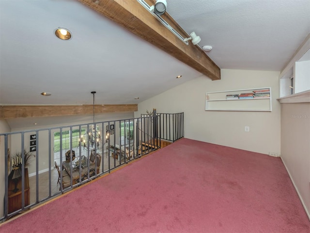 interior space with carpet, lofted ceiling with beams, and a notable chandelier