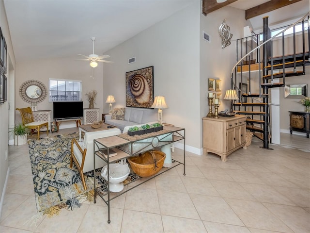 1141 Sleepy Hollow Ct, Venice, FL 34285 - living area with stairs, ceiling fan, high vaulted ceiling, light tile patterned flooring, and baseboards