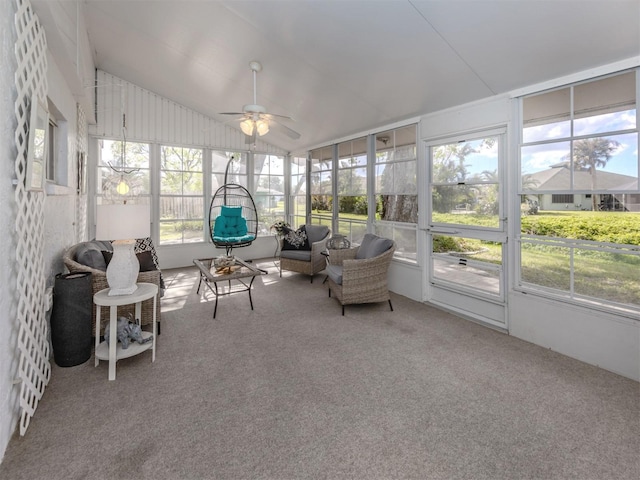 sunroom with a wealth of natural light, ceiling fan, and lofted ceiling