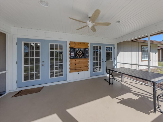 view of patio with french doors and ceiling fan