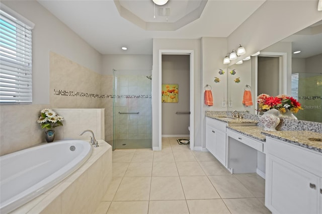 bathroom featuring tile patterned flooring, vanity, and independent shower and bath