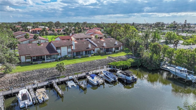 bird's eye view with a residential view and a water view