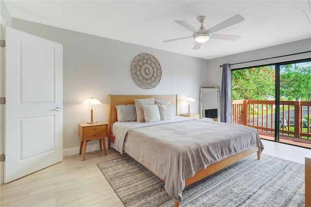 bedroom featuring a ceiling fan, access to exterior, baseboards, and light wood-type flooring