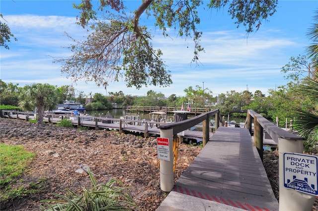 view of dock with a water view