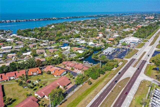 aerial view featuring a water view and a residential view