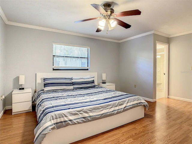 bedroom featuring ceiling fan, wood-type flooring, and ornamental molding