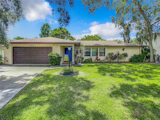 ranch-style house with a front lawn and a garage