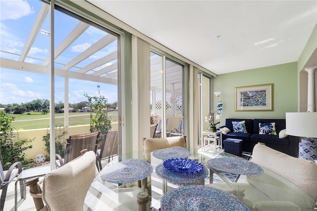 sunroom / solarium with a wealth of natural light