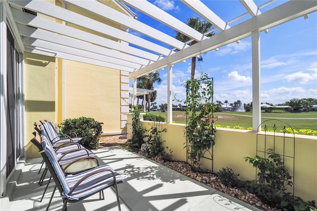 view of patio featuring a pergola