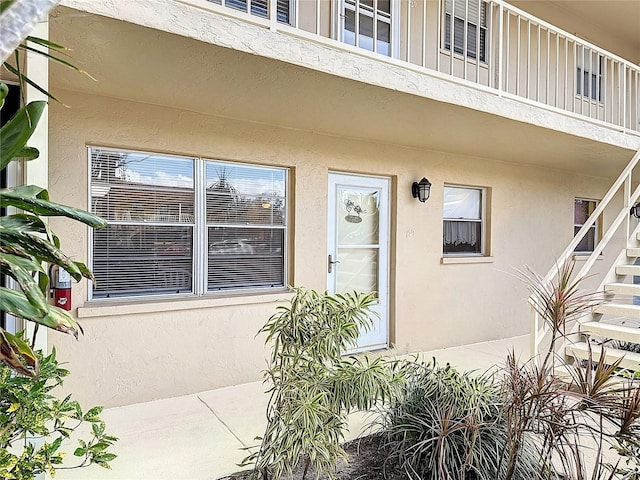210 Park Blvd N Unit 129, Venice, FL 34285 - view of exterior entry featuring stucco siding
