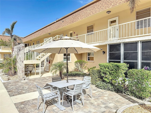 view of patio / terrace with a balcony