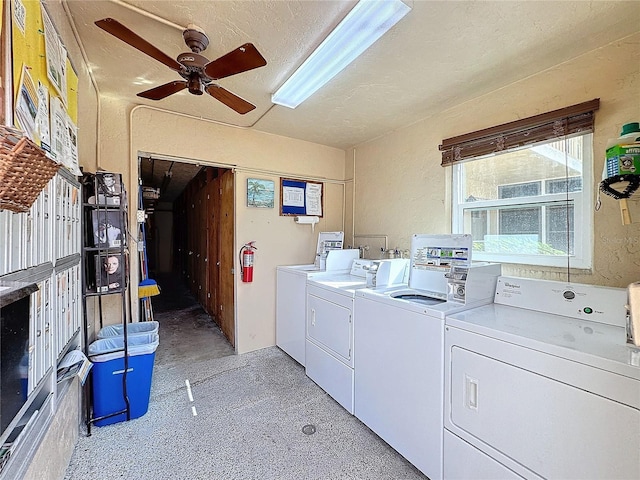 laundry area featuring independent washer and dryer, a textured ceiling, and ceiling fan