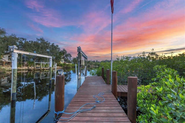 dock area featuring a water view