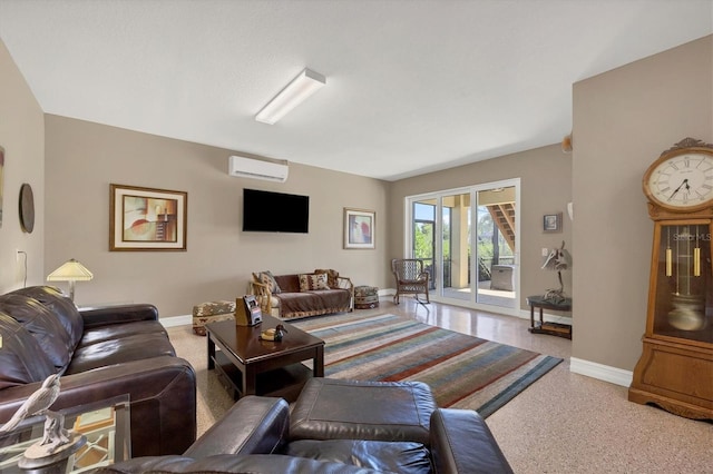 living room featuring an AC wall unit