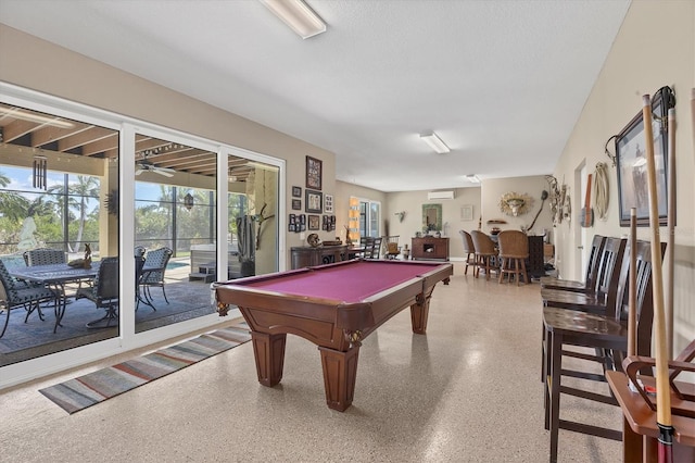 game room with a wall unit AC and pool table