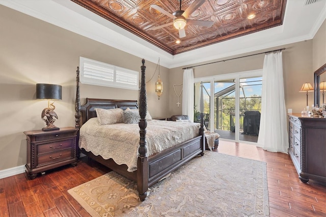 bedroom with access to outside, ceiling fan, crown molding, and dark wood-type flooring