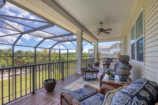 sunroom with ceiling fan